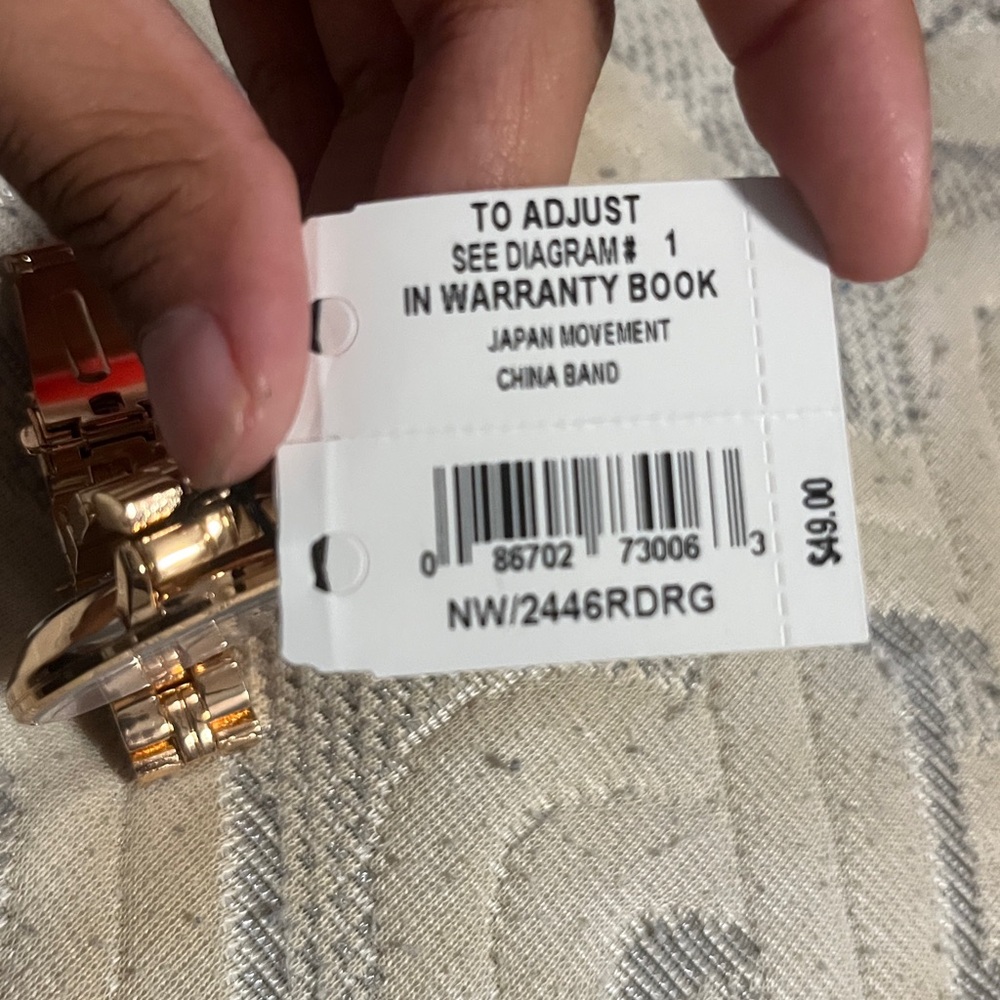 Nine West Metallic Rose Gold Watch - Picture 7 of 7